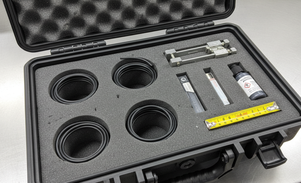 A complete vulcanized O-ring kit containing rubber cord, splicing jig, and adhesive for emergency on-site repairs