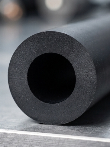 A thick-walled, dense solid tube